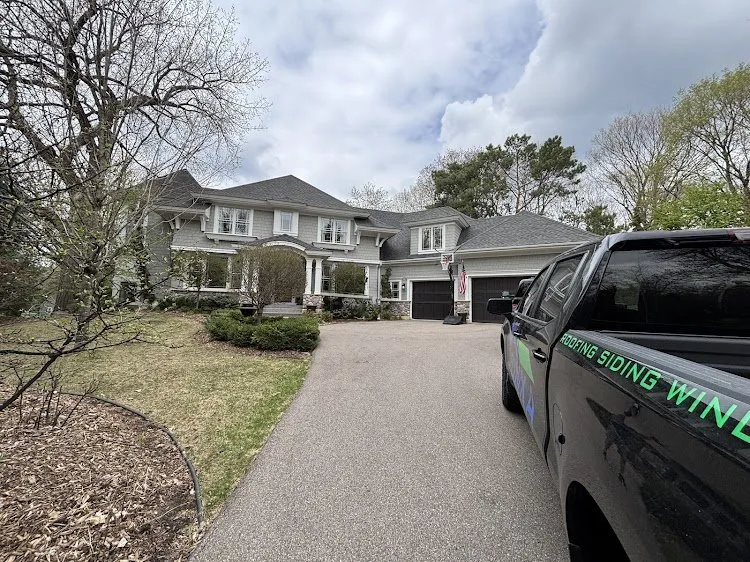 Slide of Tonka Roofing