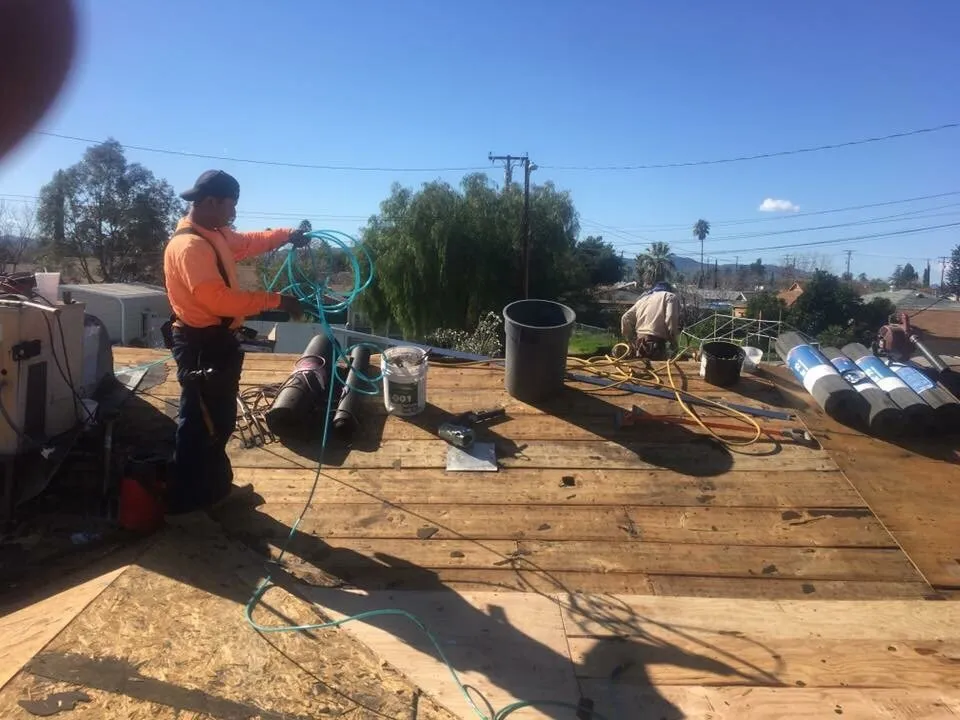 Slide of Tony and Velasco Roofing Constructions