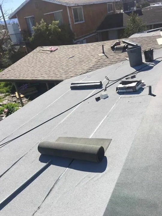 Slide of Tony and Velasco Roofing Constructions