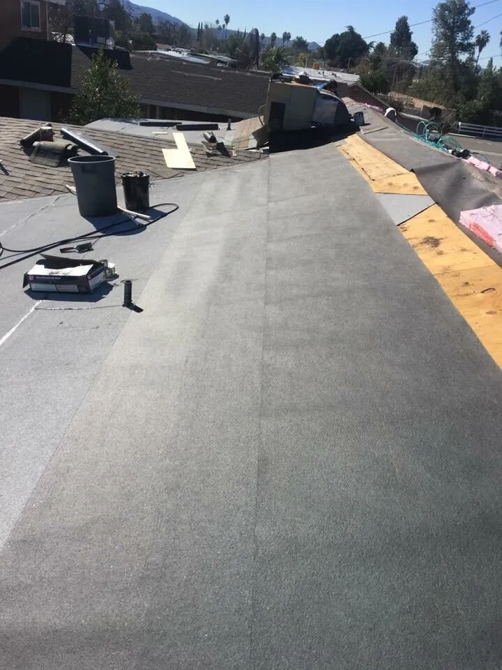 Slide of Tony and Velasco Roofing Constructions