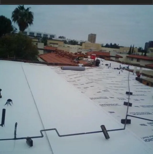 Slide of Tony and Velasco Roofing Constructions