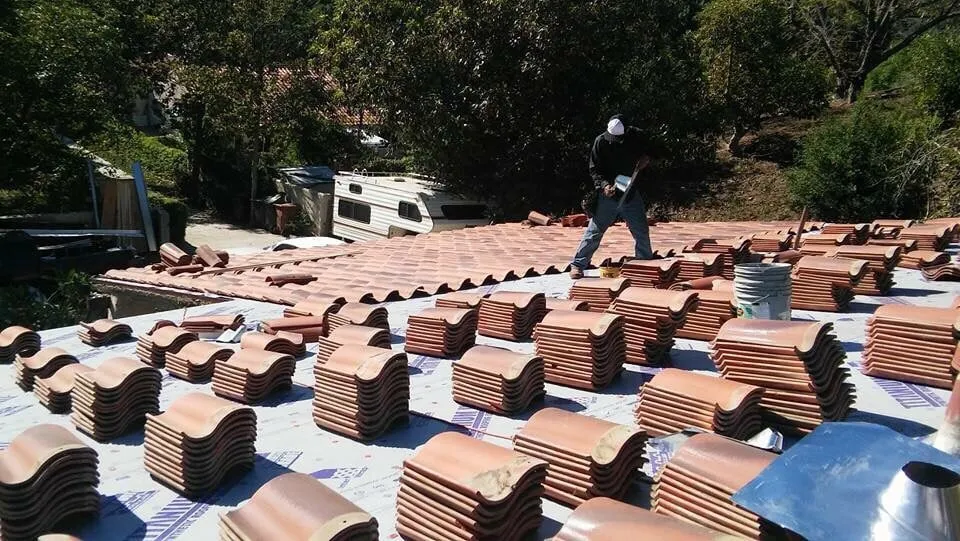 Slide of Tony and Velasco Roofing Constructions