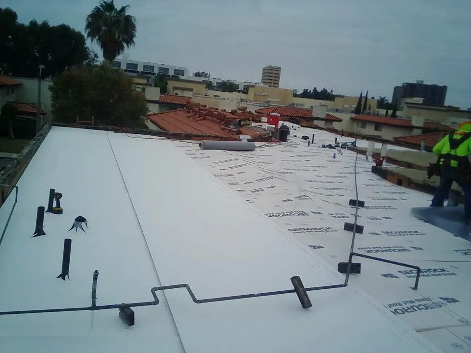 Slide of Tony and Velasco Roofing Constructions