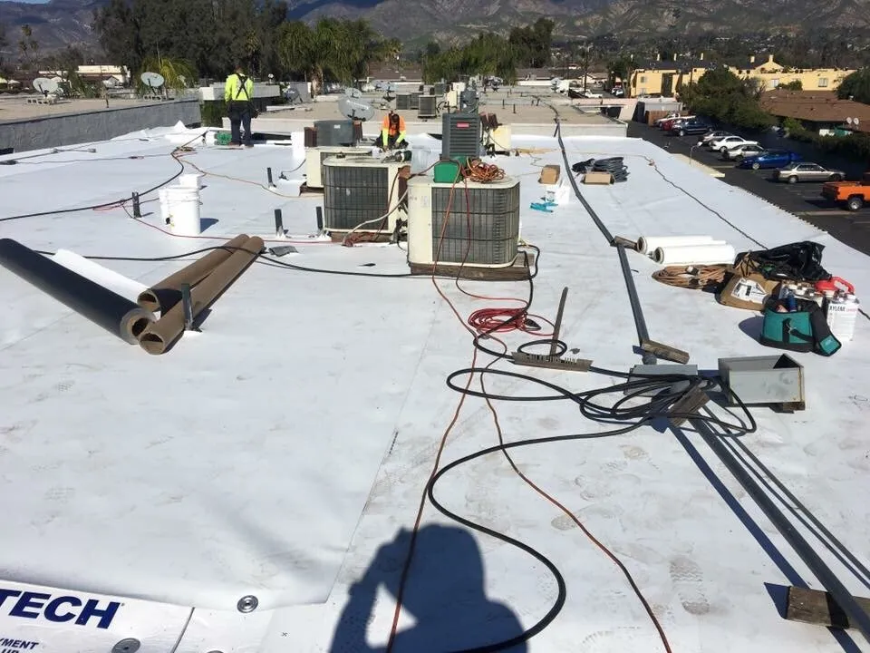 Slide of Tony and Velasco Roofing Constructions