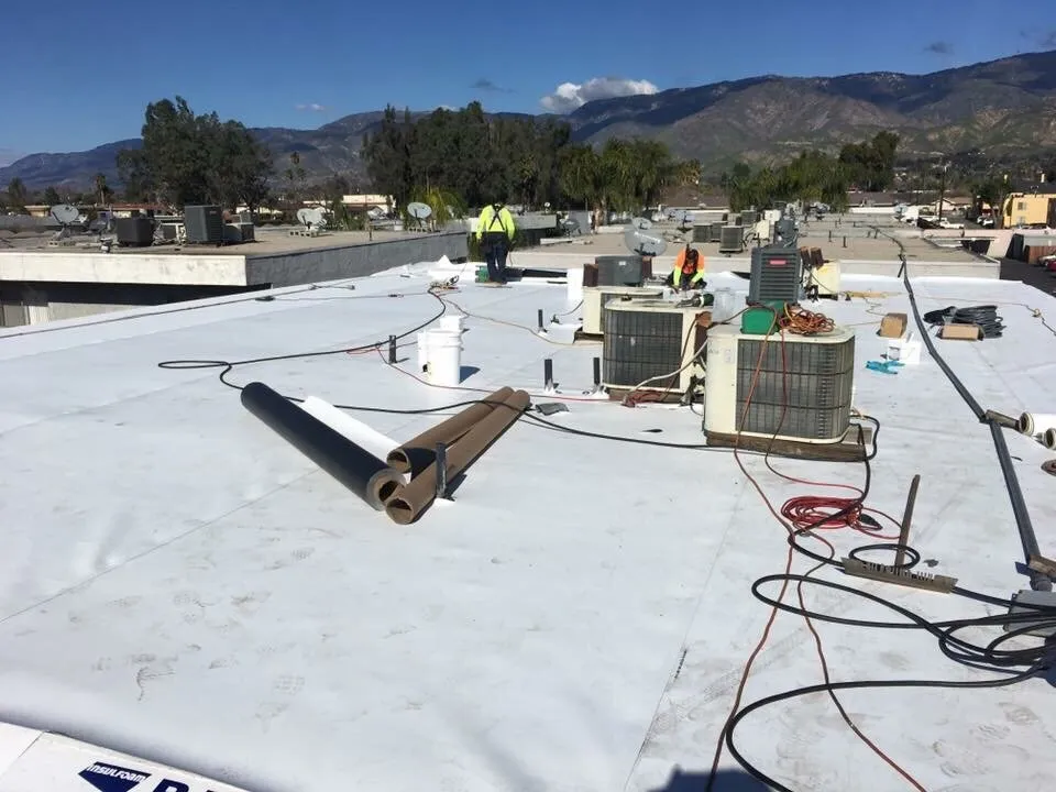 Slide of Tony and Velasco Roofing Constructions