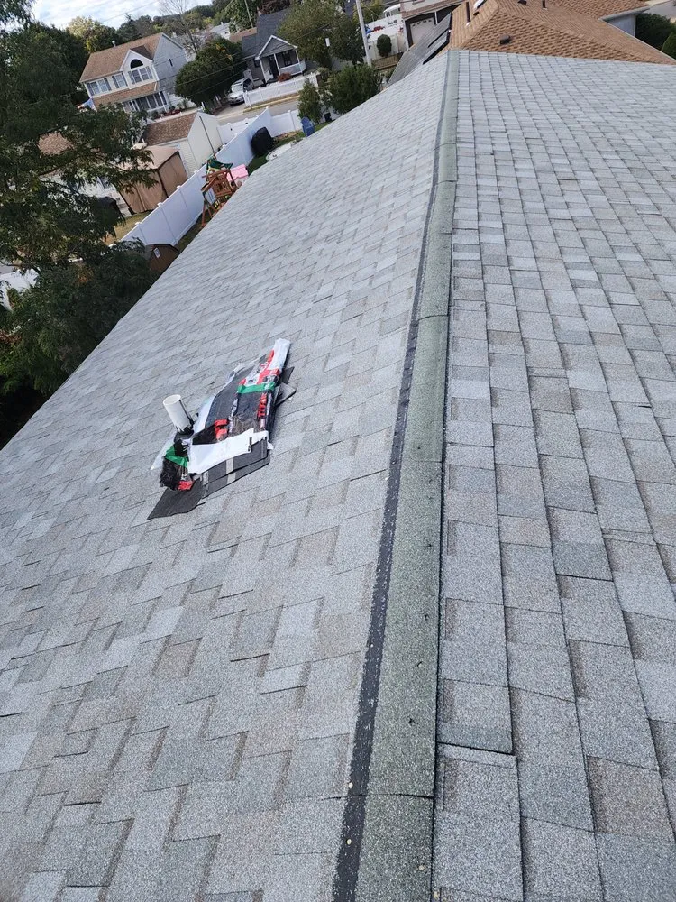 Slide of Tony Roofing