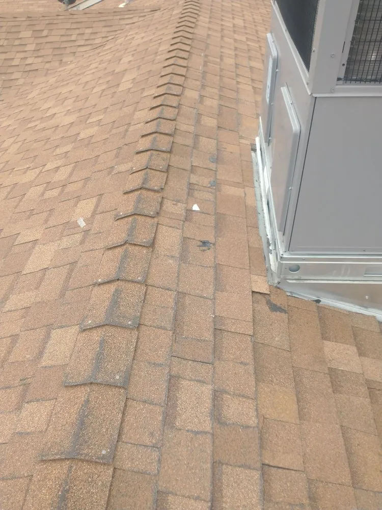 Slide of Tony's Roofing