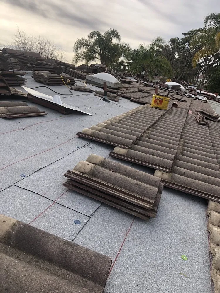 Slide of Tony's Roofing