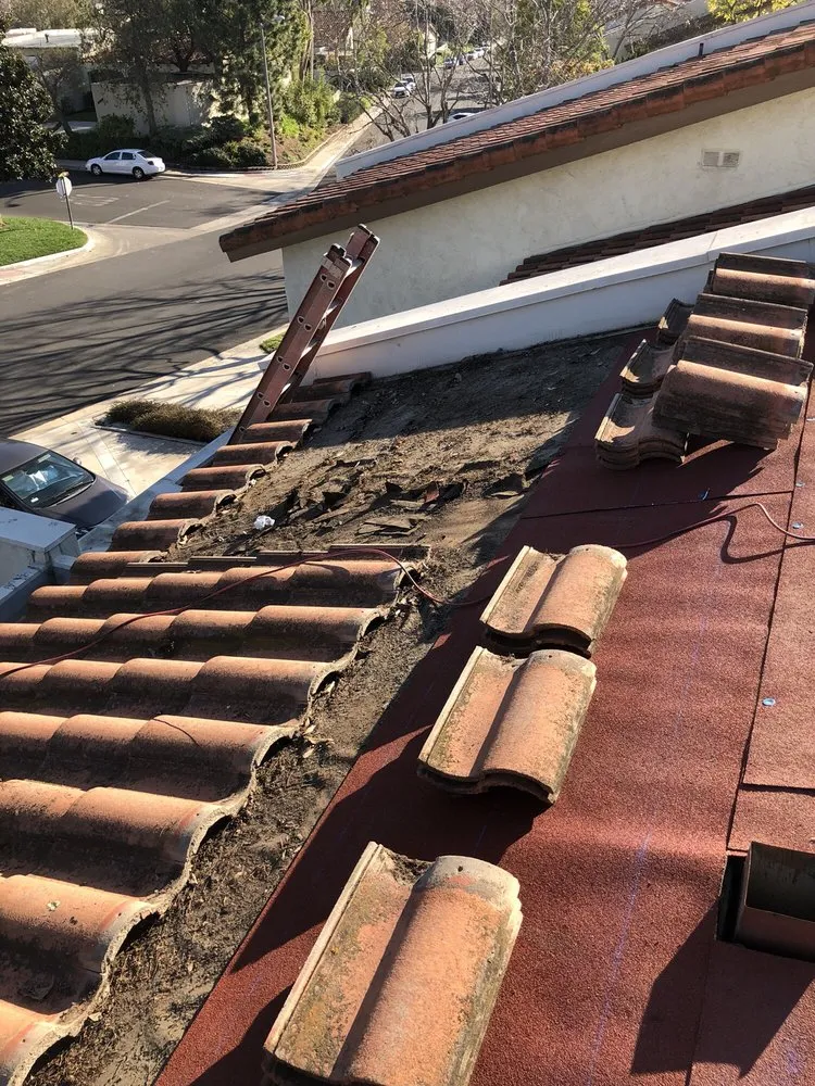 Slide of Tony's Roofing