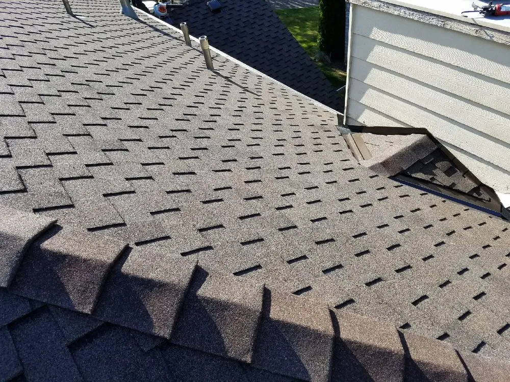 Slide of Tonys Roofing