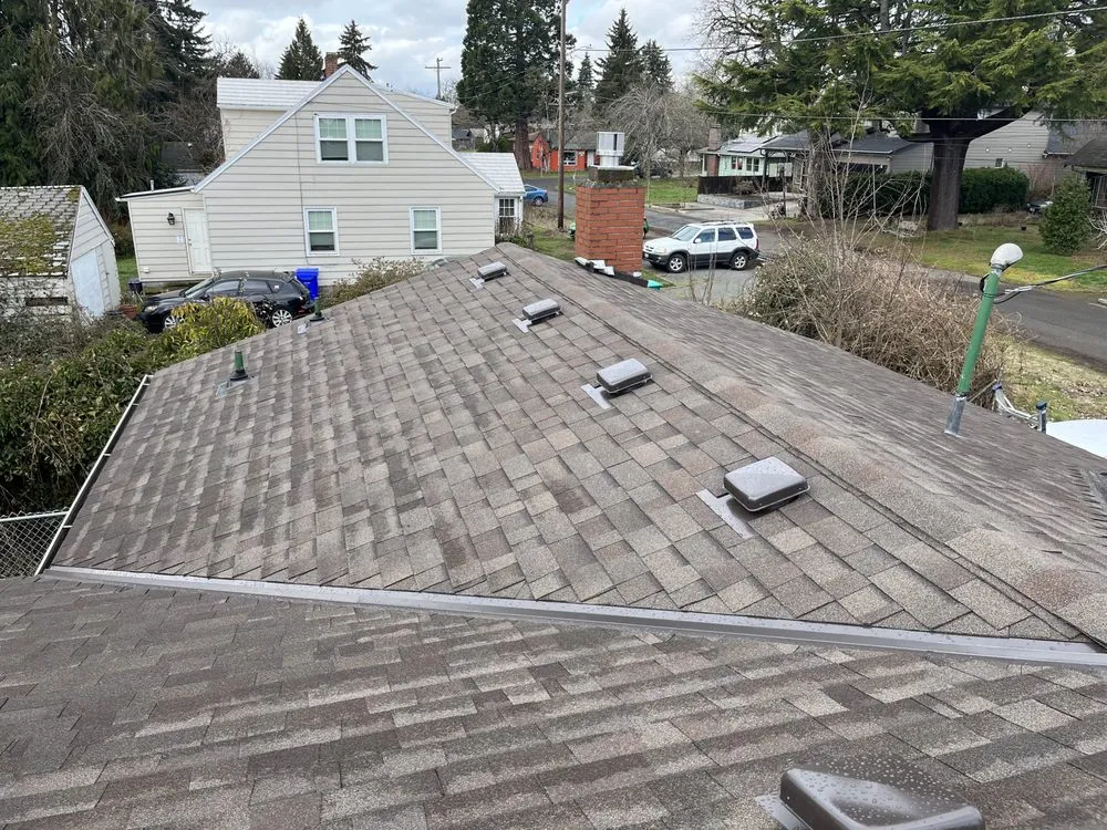 Slide of Tonys Roofing