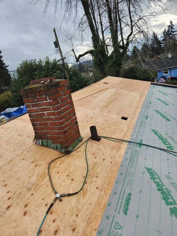 Slide of Tonys Roofing