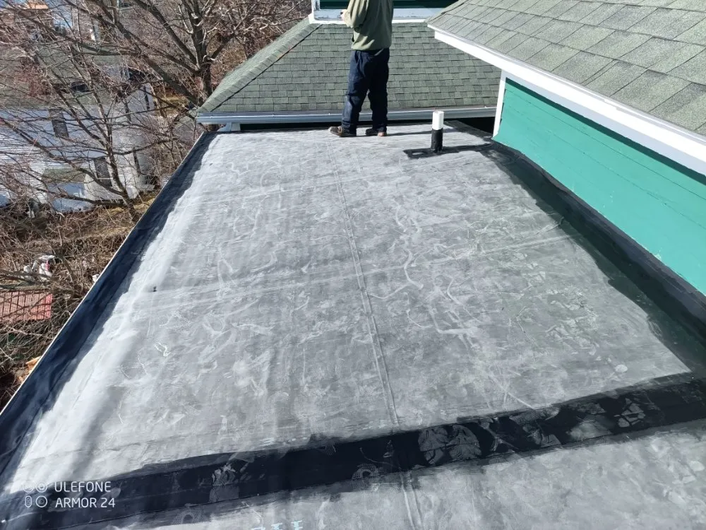 Slide of Tony's Roofing Service