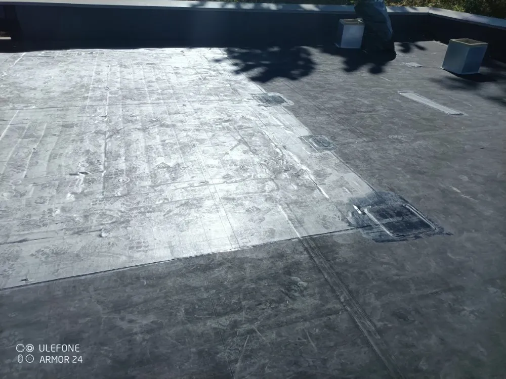 Slide of Tony's Roofing Service