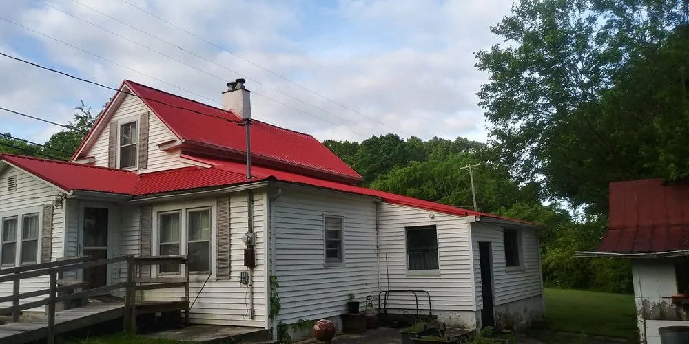 Slide of Tony's Roofs