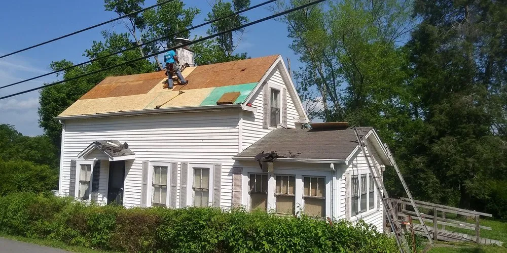 Slide of Tony's Roofs