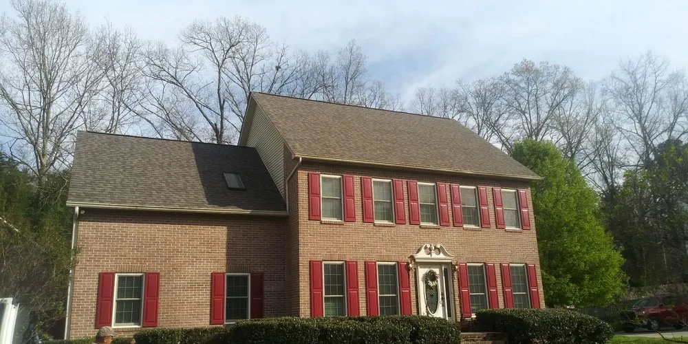 Slide of Tony's Roofs