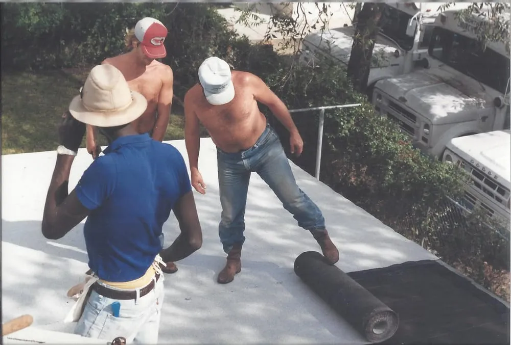 Slide of Tooter's Roofing