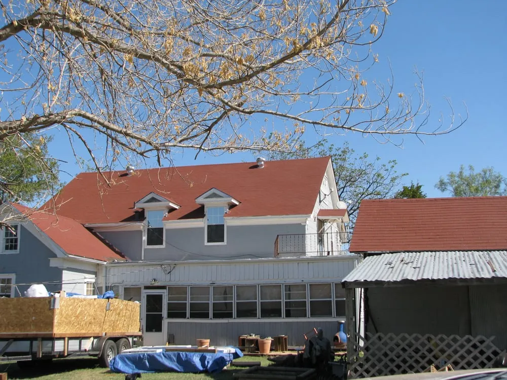 Slide of Tooter's Roofing