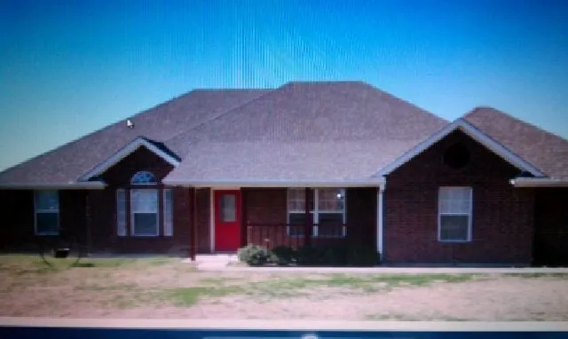 Slide of Tooter's Roofing