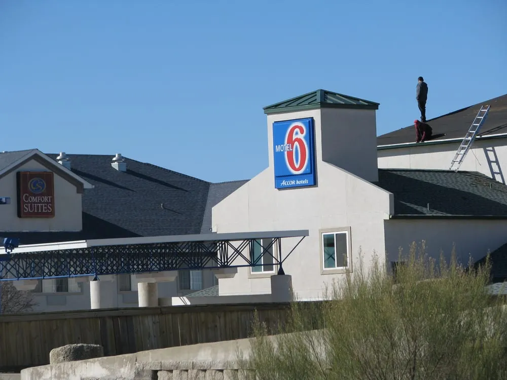 Slide of Tooter's Roofing