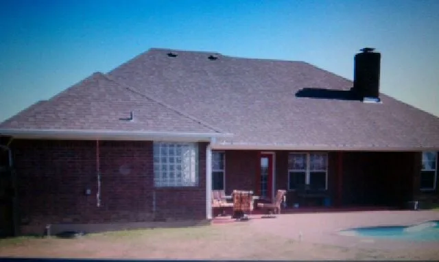 Slide of Tooter's Roofing