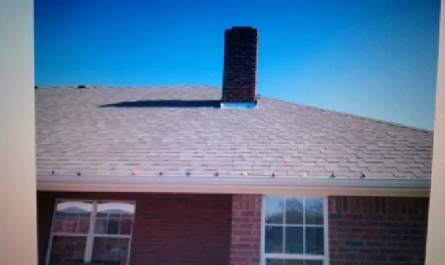 Slide of Tooter's Roofing