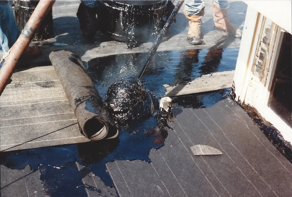 Slide of Tooter's Roofing