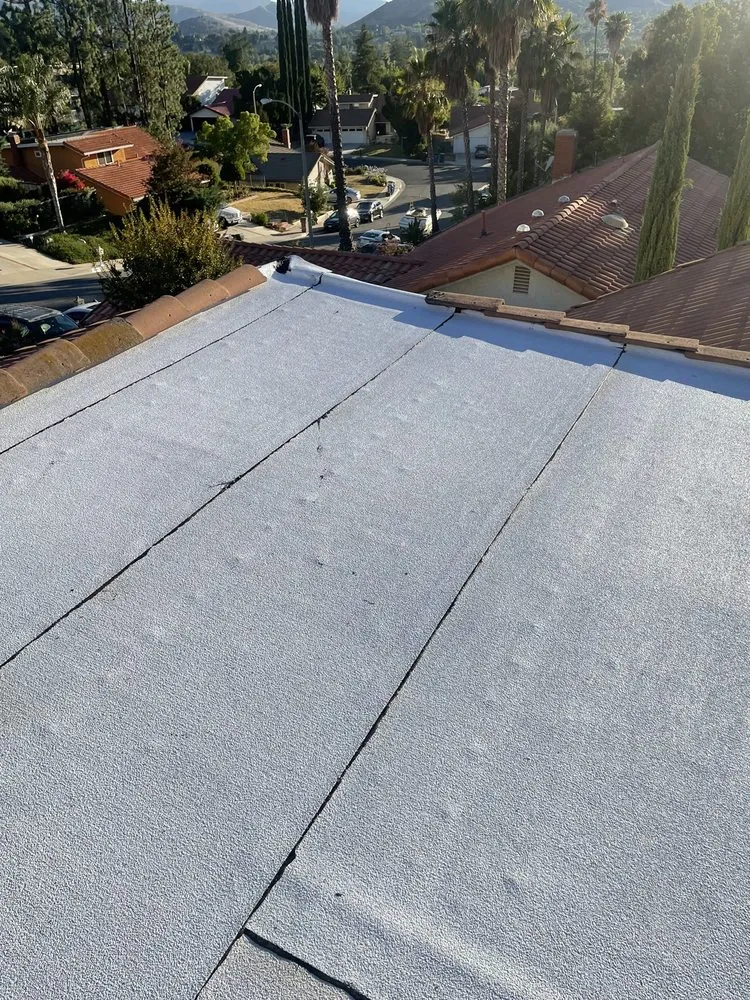 Slide of Top Armor Roofing