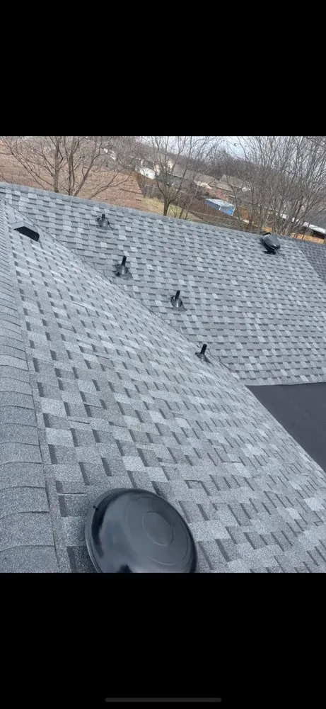 Slide of Top Dawg Roofing