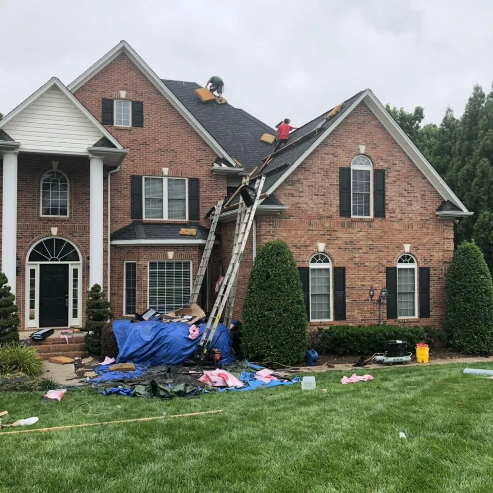 Slide of Top Dog Roofing Company
