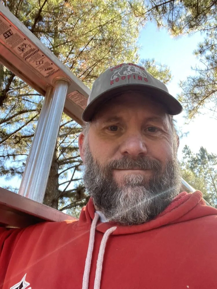 Slide of Top Dog Roofing Company