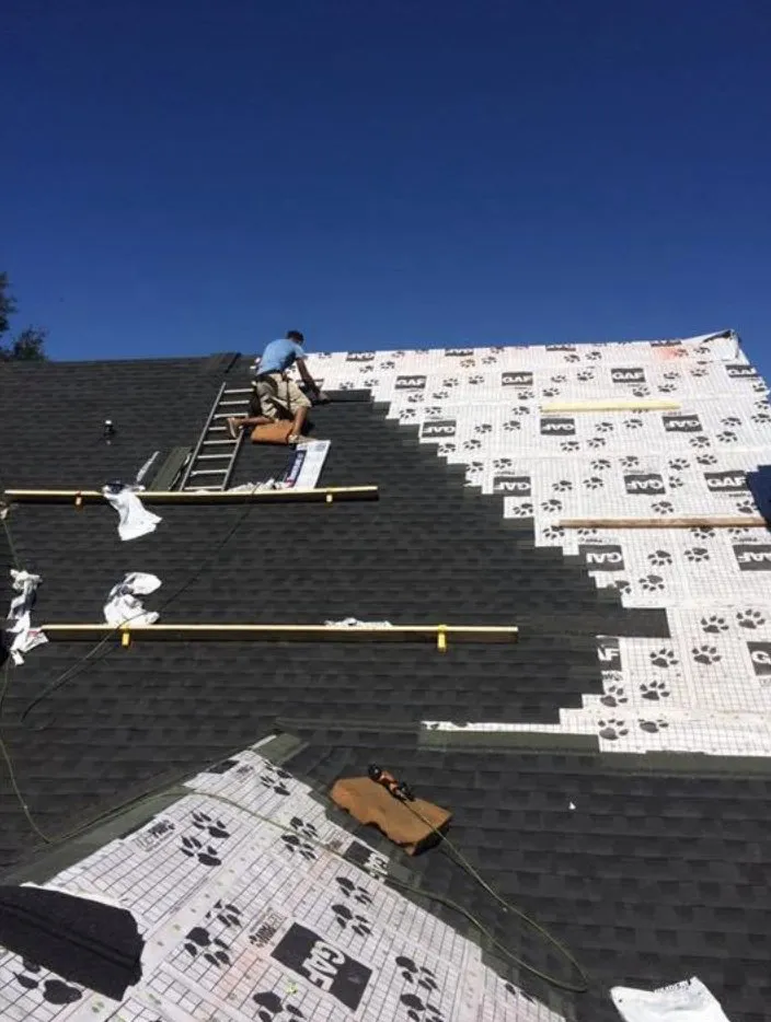 Slide of Top Dog Roofing Company