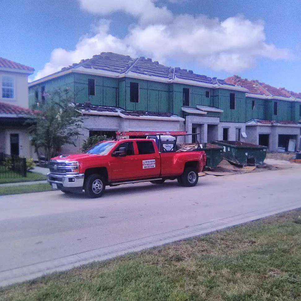 Slide of Top Dog Roofing