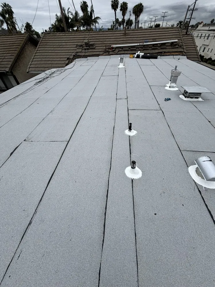 Slide of Top dog Roofing