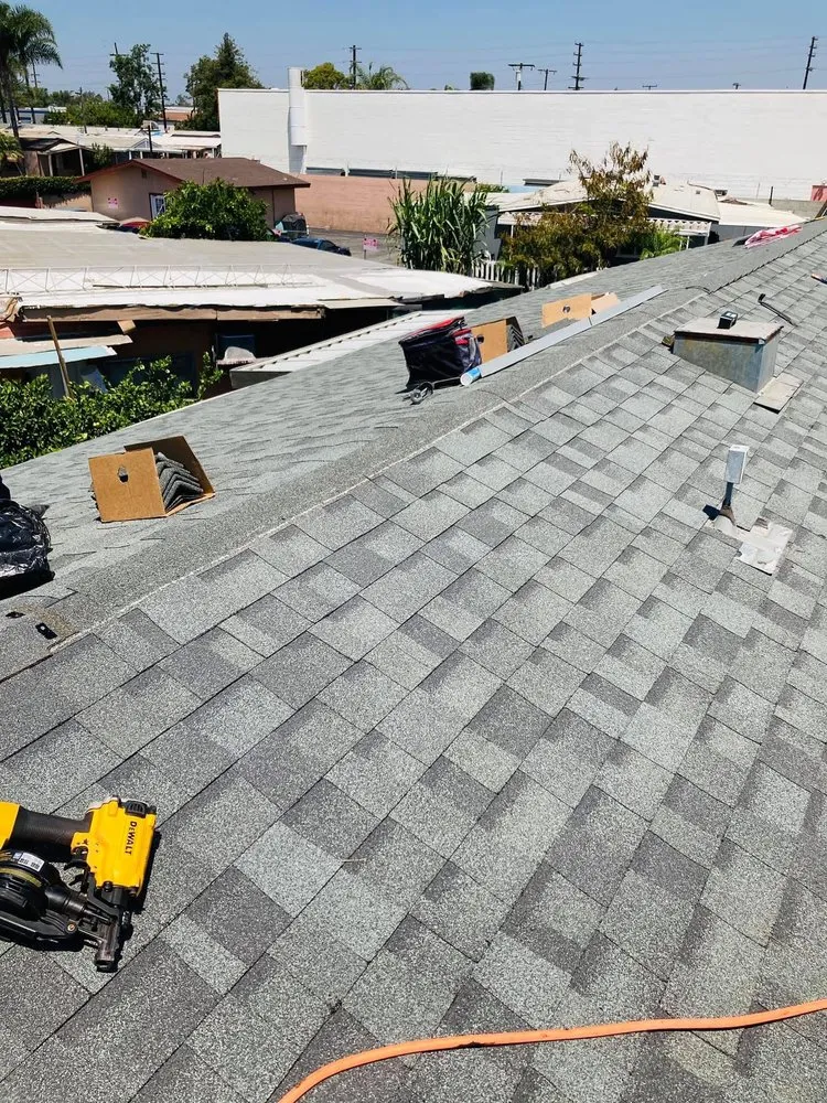 Slide of Top dog Roofing