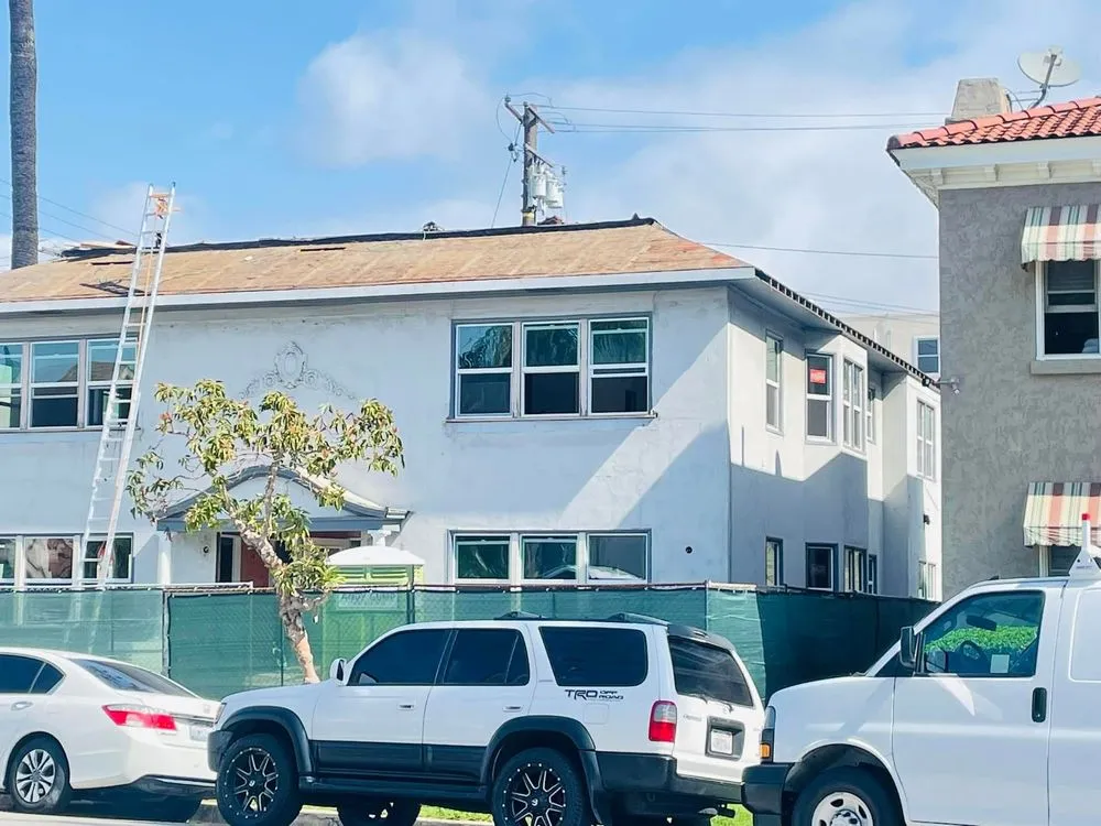 Slide of Top dog Roofing