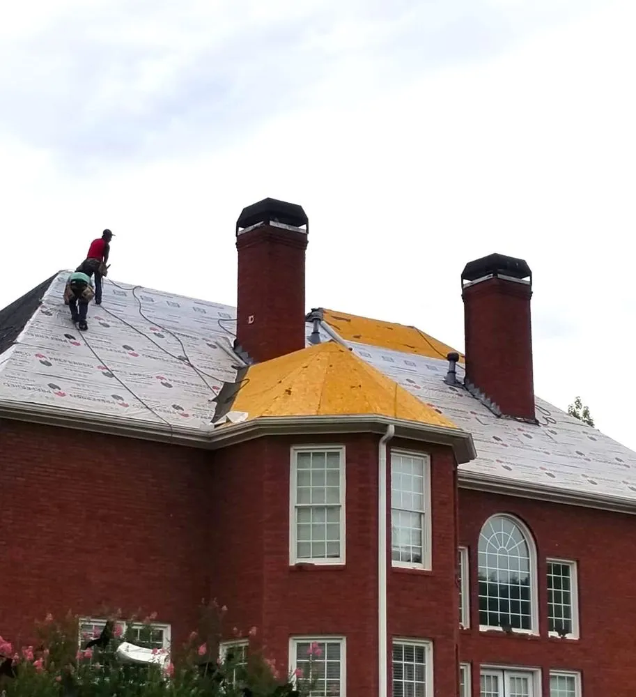 Slide of Top Edge Roofing and Construction