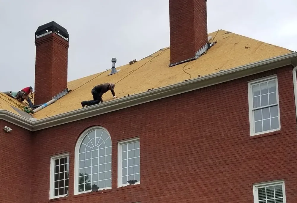 Slide of Top Edge Roofing and Construction