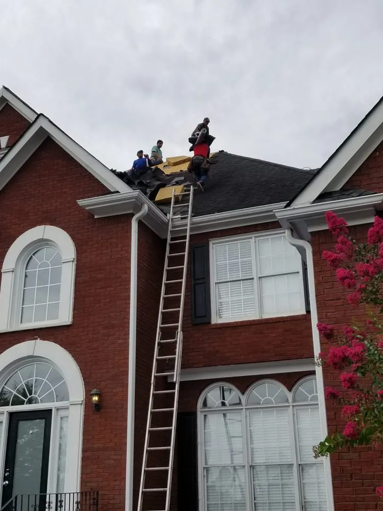 Slide of Top Edge Roofing and Construction