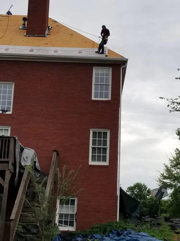 Slide of Top Edge Roofing and Construction