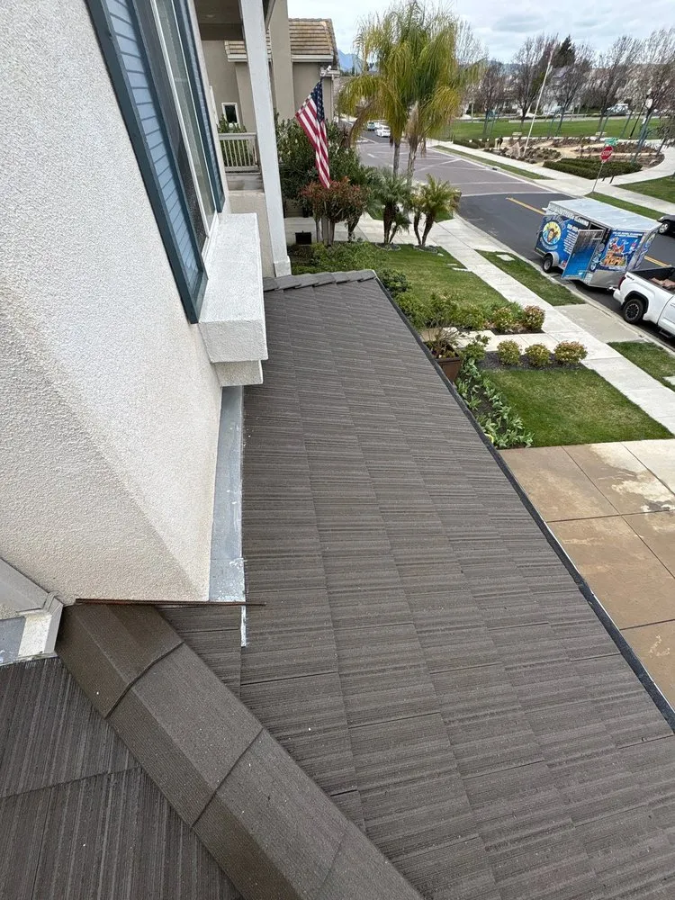 Slide of Top Elevation Roof Cleaning And Repair