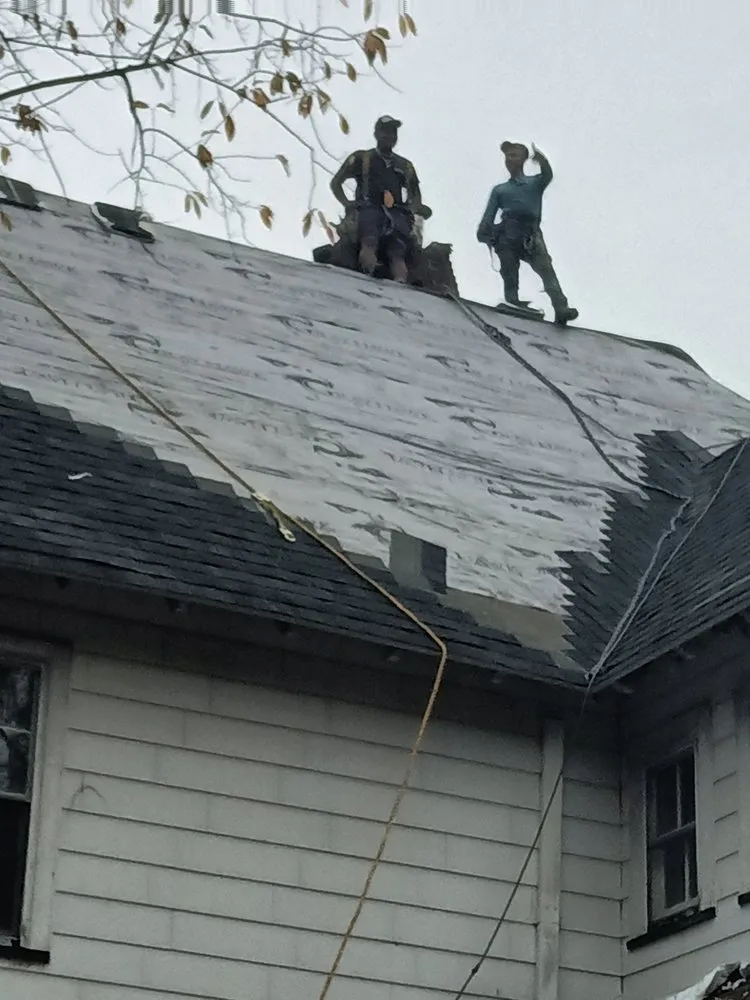 Slide of Top Flight Roofing