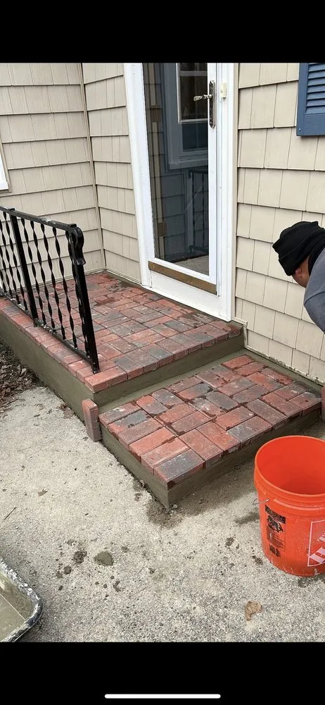 Slide of Top Glow Masonry and Roofing