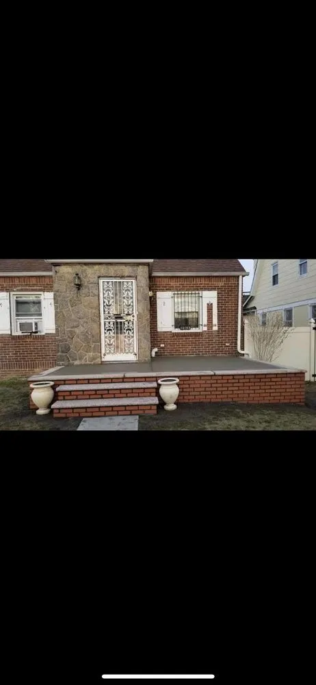 Slide of Top Glow Masonry and Roofing