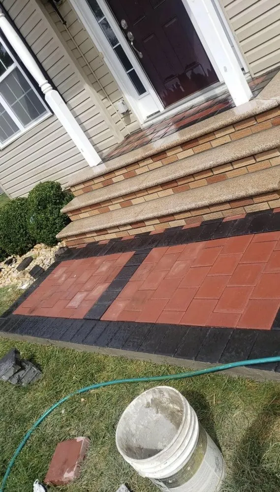 Slide of Top Glow Masonry and Roofing