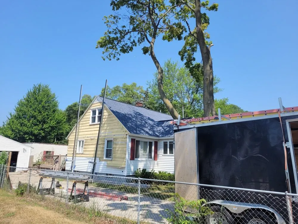 Slide of Top Gun Roofing & Exteriors