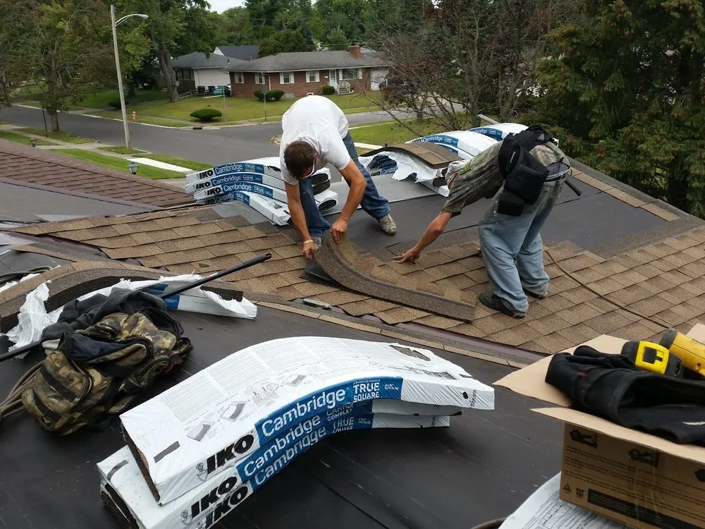 Slide of Top Gun Roofing and Restoration Services