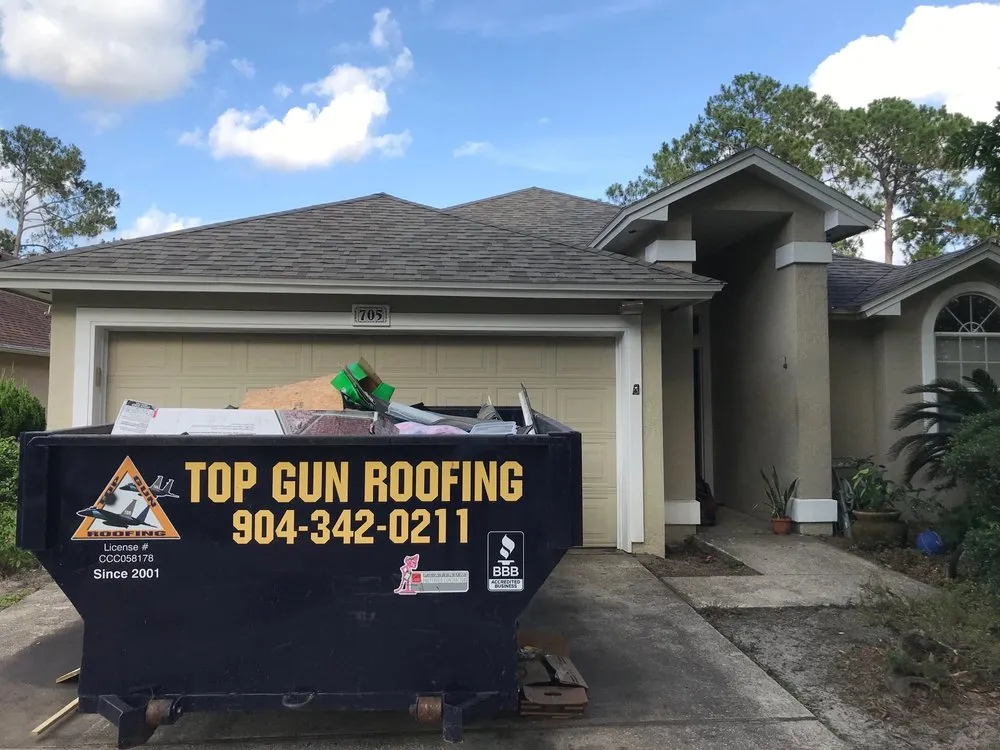 Slide of Top Gun Roofing