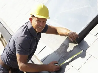 Slide of Top Gunz Roofing